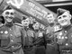 Герои рядом со Знаменем Победы  в Москве. Первый справа — Степан Неустроев. Неизвестный фотограф